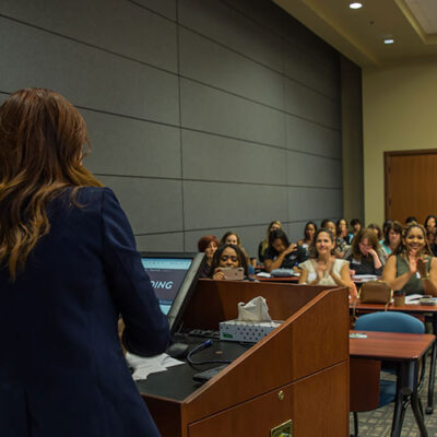 Anna-Vija McClain speaking to group of small business professionals